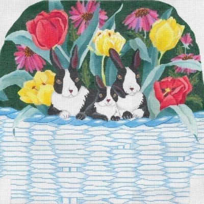 Bunnies In A Basket With Flowers Pillow